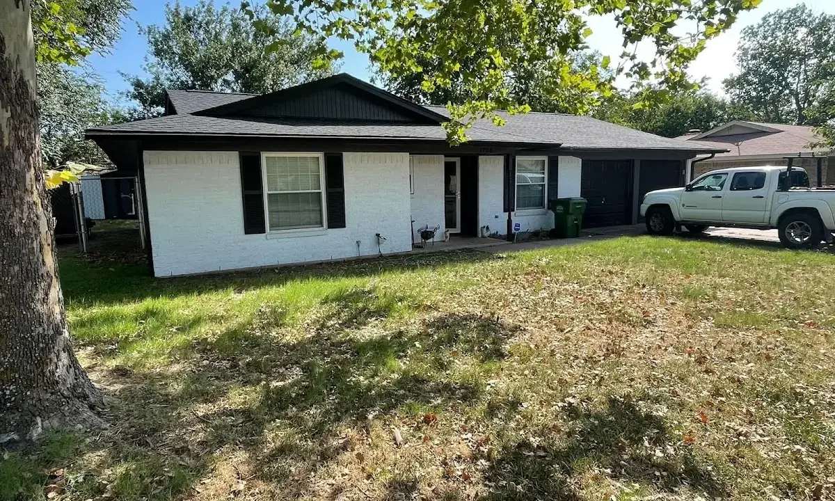 Professional roofing crew working on a residential roof in Murphysboro